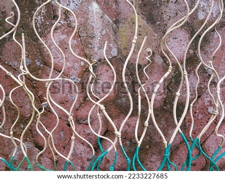 Old distressed concrete wall with white and blue wavy wire design background texture