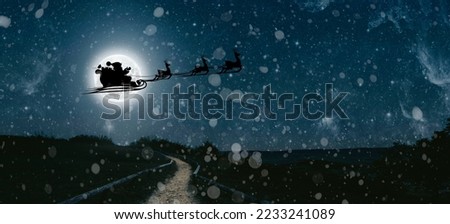 Santa Claus flies on Christmas Eve in the night sky with snow