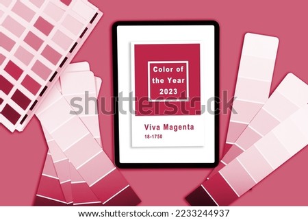 Color samples palette design catalog with tablet. New 2023 trending PANTONE 18-1750 Viva Magenta color