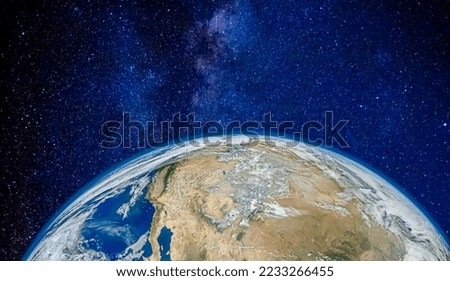 Planet Earth in the space. Millions of stars in the background. Space, sci-fi background photo. Elements of this image furnished by NASA.