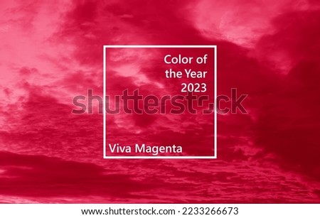sunset sky clouds, Dramatic red purple cloudscape background at sunset time. Image toned in trendy pantone color of year 2023 Viva Magenta.