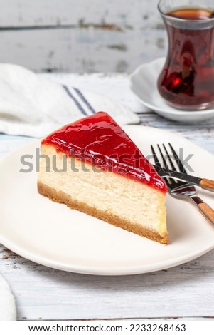 Cheesecake. New York cake. Raspberry cheesecake on wood floor background. close up Royalty-Free Stock Photo #2233268463