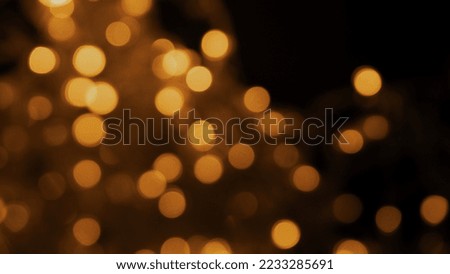 Web banner. Abstract background of blurred yellow lights for design. Lights bokeh dis focus. Christmas background, copy space