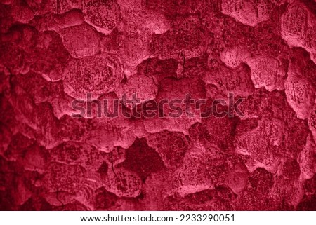 Viva magenta trendy color palette. Tree bark texture. New color of the year 2023. Red magenta tones and shades. Magenta floral background. 