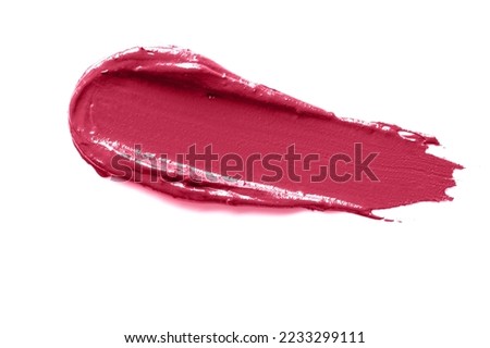 Magenta smudged lipstick isolated on white background.