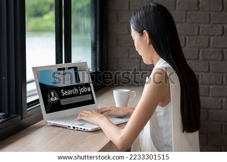 Asian woman browsing work opportunities online using job search computer. Job Search Career Recruitment Occupation Career Concept.