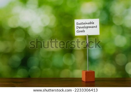 There is piece of paper with the word Sustainable Development Goals.