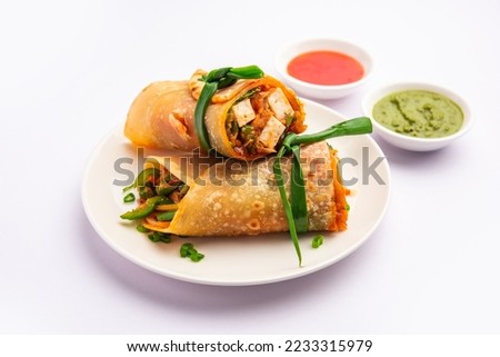 Cottage Cheese Paneer kathi roll or wrap known as kolkata style spring rolls Royalty-Free Stock Photo #2233315979