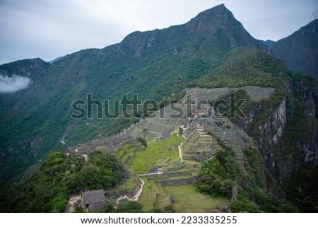 A day trip in Machu Picchu in Peru, one of the seven wonders of the world. Royalty-Free Stock Photo #2233335255