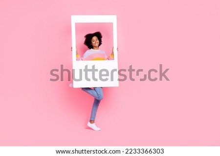 Full size photo of good mood funny girl with perming coiffure dressed knit pullover smiling in frame isolated on pink color background