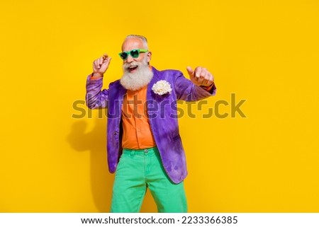 Photo portrait of handsome grandparent dancing party maker superstar dressed stylish colorful clothes isolated on yellow color background Royalty-Free Stock Photo #2233366385