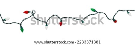 Isolated c9 bulb red green and white colored holiday lights string

