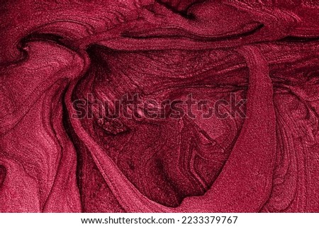 Liquid shimmer background,monochrome red color.