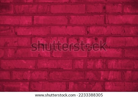 Viva Magenta toned colour grunge decorative brick wall background. Art rough stylized texture banner trendy color 2023. Grunge Viva Magenta color texture Royalty-Free Stock Photo #2233388305