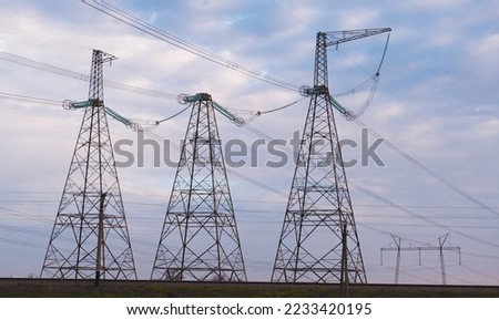 High-voltage wires against the backdrop of cold weather in Ukraine. Energy and electricity. The threat of de-energized cities. Energy supply of the country. electricity generation Royalty-Free Stock Photo #2233420195