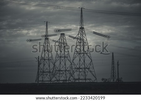 High-voltage wires against the backdrop of cold weather in Ukraine. Energy and electricity. The threat of de-energized cities. Energy supply of the country. electricity generation Royalty-Free Stock Photo #2233420199
