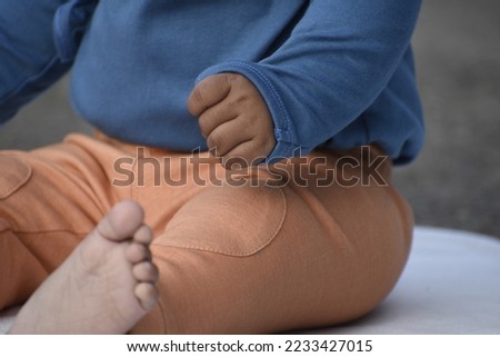Indian baby clothing garment detail picture photograph