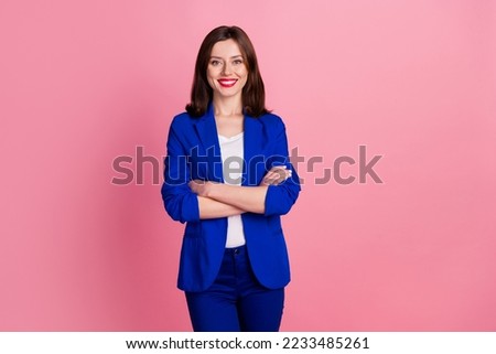 Photo of positive smile good mood creative director business lady wear blue formal costume crossed hands satisfied isolated on pink color background