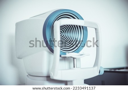 Optical biometer and full corneal topographer. measures axial length, corneal topography, pupillometry, corneal diameter and anterior chamber depth. Royalty-Free Stock Photo #2233491137