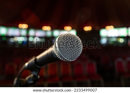 Microphone on a stand in a comedy venue at the Edinburgh festival fringe arts festival Royalty-Free Stock Photo #2233499007