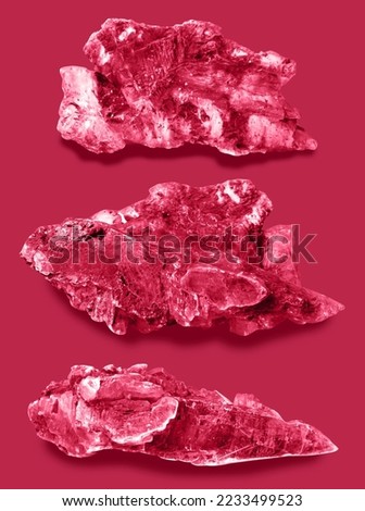 Natural stones in viva magenta color, which is the color of the year 2023. The picture contains work path.
