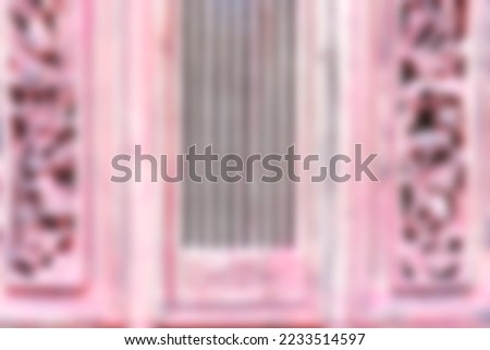 blurred pale red old window pane background use as backdrop