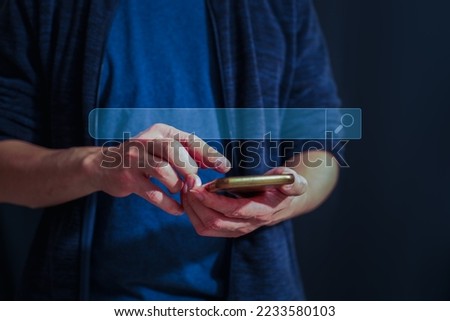 Man Searching Browsing Internet Data Information with blank search bar.Search Engine Optimization SEO Networking Concept.hand of businessman working with Smart phone.