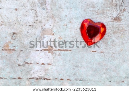 Heart shape on background in love concept for Valentine’s Day, small heart shape representing love