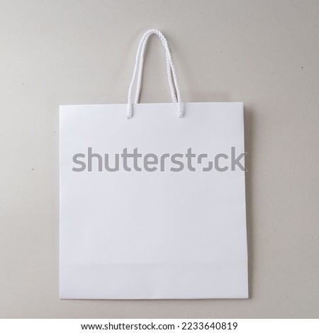 white shopping bag one white background and copy space for plain text or product