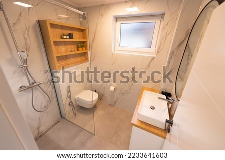 Luxurious minimalist bathroom in modern townhouse