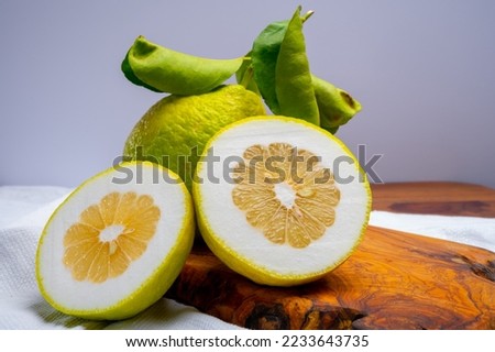 Lemon citron cedrate or Citrus medica, large fragrant citrus fruit with thick rind used for making italian limonchello liquor Royalty-Free Stock Photo #2233643735