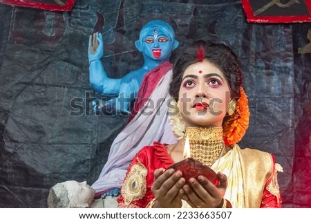 kali Puja Look Photo-shoot based on Festival with ethnic look.like A face of Hindu married woman.front of an idol  Happy Navratri, Indian Hindu Celebration