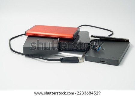 Group of external hard drives Royalty-Free Stock Photo #2233684529
