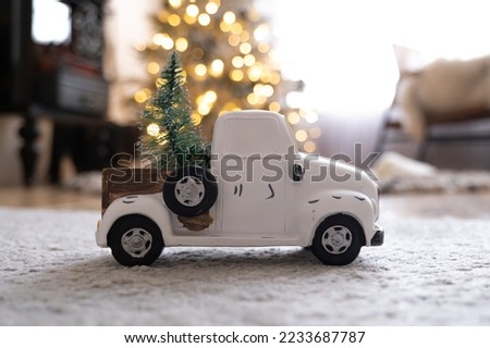 Christmas toy car with a small tree