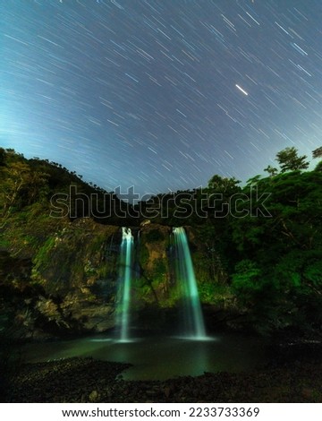 Sodong Waterfall at starry night with milky way, located in ciletuh Sukabumi, Indonesia