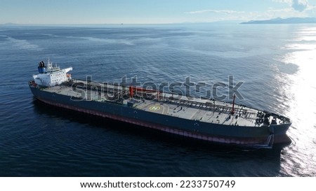 Aerial drone photo of latest technology industrial crude oil - fuel tanker ship cruising deep blue Mediterranean sea