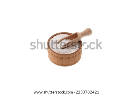 Sodium benzoate in wooden bowl isolated on white. Sodium salt of benzoic acid. White chemical powder, C6H5COONa. Food additive E211 used as preservative in many foods, drinks, cosmetics. Royalty-Free Stock Photo #2233782421