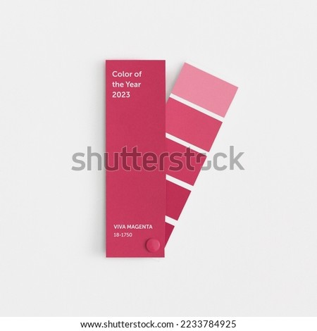 Color swatch with color of the year 2023 - Viva Magenta. Color trend palette. Top view, flat lay.