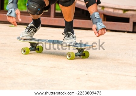 The practice of the sport of Skateboard performed on a board, with four small wheels and two axles