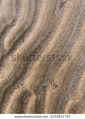 Wave sand on the beach