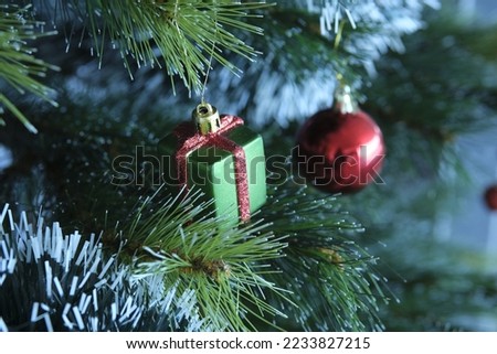 Miniatur of ball, shoes. heart on artificial tree. Decoration and ornament. Miniatur bola, sepatu dan hati