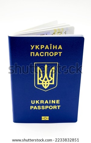 biometric foreign passport of Ukraine close-up on a white background, vertical