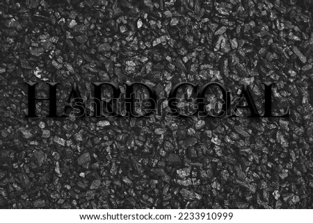 Fuel for furnace heating - hard coal. Pile of natural black hard coal for texture background. Best grade of metallurgical anthracite coals often referred to as stone coal and black diamond coal. Royalty-Free Stock Photo #2233910999