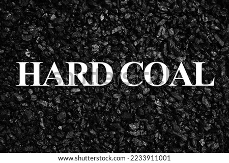 Fuel for furnace heating - hard coal. Pile of natural black hard coal for texture background. Best grade of metallurgical anthracite coals often referred to as stone coal and black diamond coal. Royalty-Free Stock Photo #2233911001