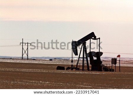 Oil pump jack in winter