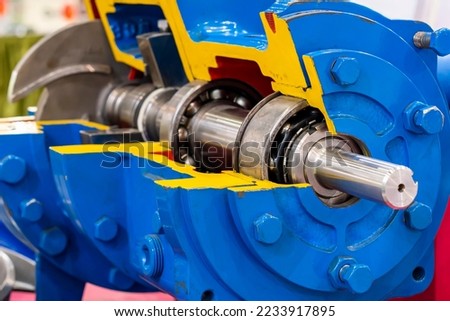 Close up cross section present detail component inside centrifugal pump for industrial such as vane or impeller rotor shaft bearing housing casing etc. Royalty-Free Stock Photo #2233917895