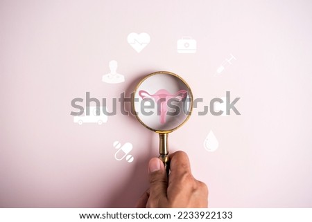 uterus female reproductive system, women health, PCOS, ovary gynecologic and cervical cancer, magnifier focus to uterus icon, Healthy feminine concept	 Royalty-Free Stock Photo #2233922133