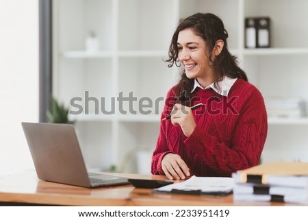 American business woman making prepare presentation or important email of financial. Business Accountant working in home office. Royalty-Free Stock Photo #2233951419