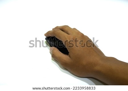 The computer black mouse wireless in hand on a white background