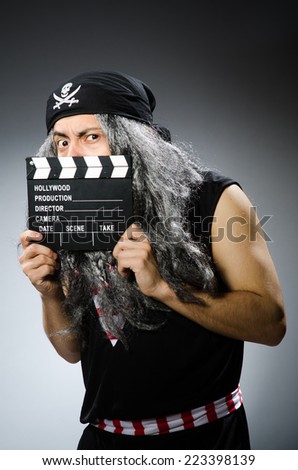 Old pirate with movie board